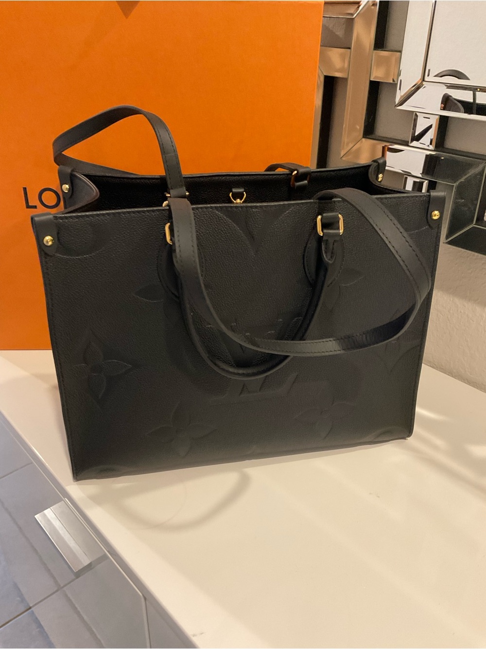 Louis Vuitton on the go mm shoulder bag